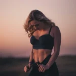 žena